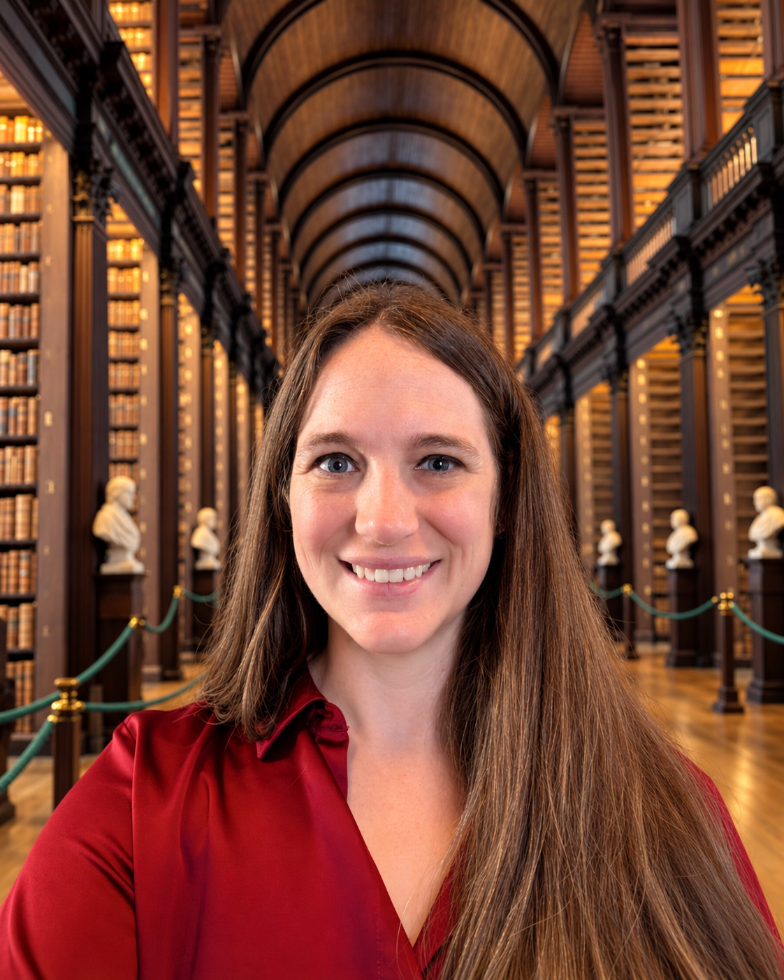 Christina Lommatsch smiling in a historic library